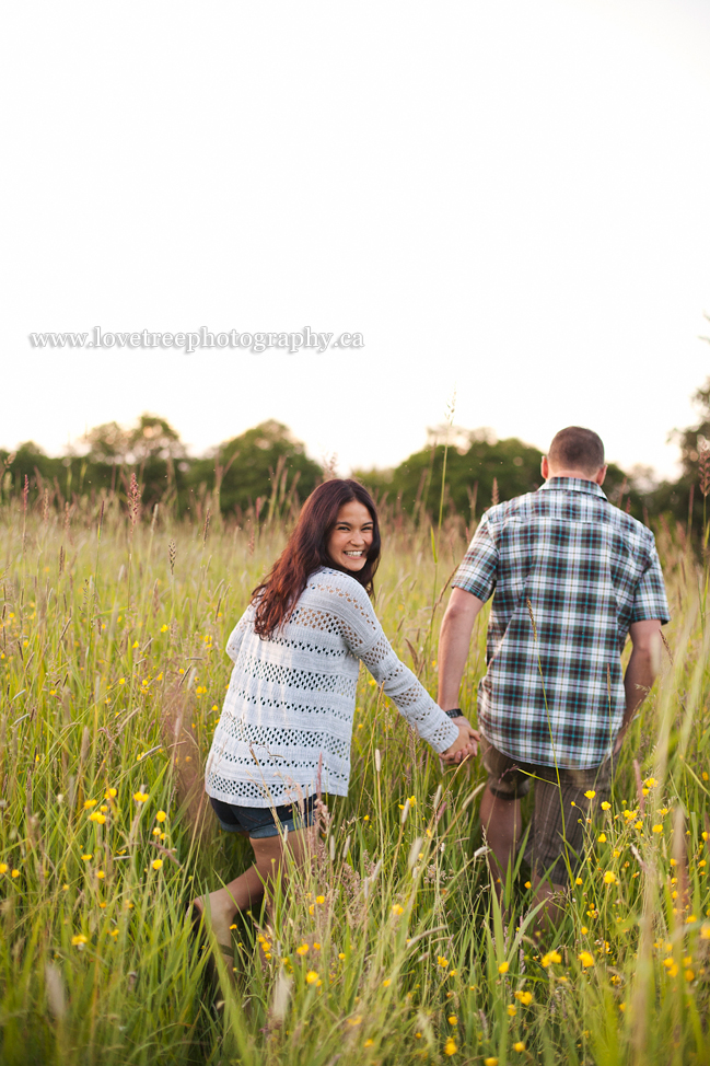 taking a stroll through the countryside. ; image by wedding photographers http://www.lovetreephotography.ca