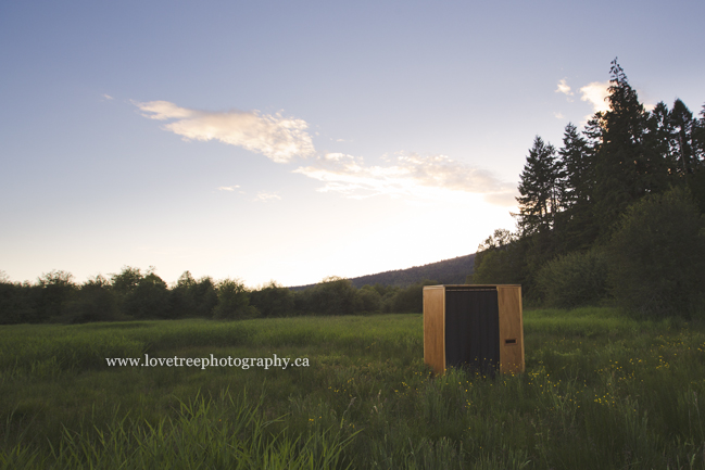 a rustic wooden photobooth rental - the perfect addition to a vintage or shabby chic wedding. image by Vancouver wedding photographers www.lovetreephotography.ca