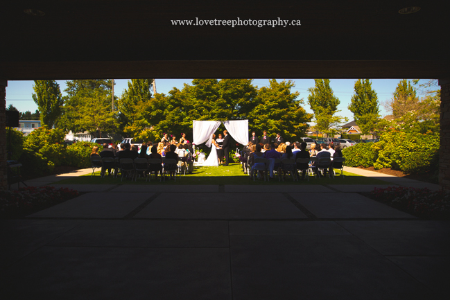 wedding ceremony at Beach Grove Golf Club; image by vancouver wedding photographers www.lovetreephotography.ca