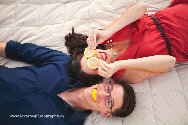 a citrusy picnic themed engagement session in Deer Lake Park by Vancouver wedding photographers www.lovetreephotography.ca