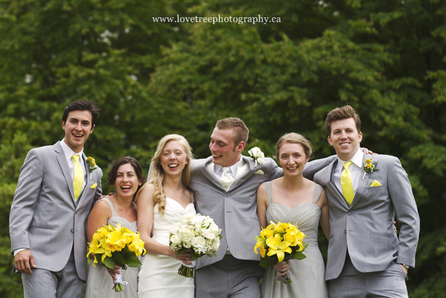 a casual portraits of the entire wedding party having a good time. image by destination wedding photographers www.lovetreephotography.ca