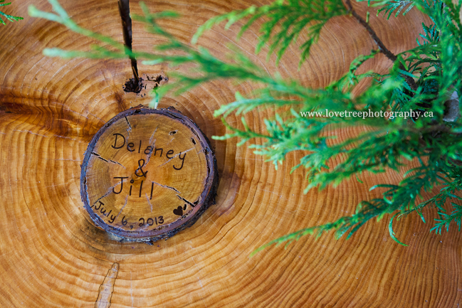wooden guestbook at a rustic wedding | image by www.lovetreephotography.ca