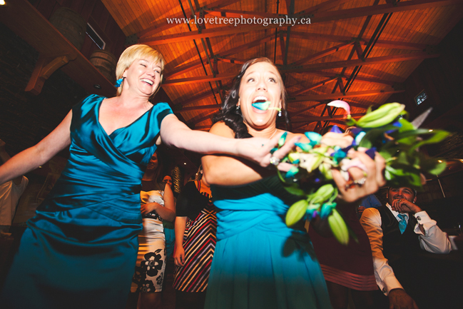 funny bouquet toss | fun and fresh wedding photography by www.lovetreephotography.ca